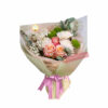 It is a Baby Flowers Bouquet - Wrap With Purple Ribbon - Floral design